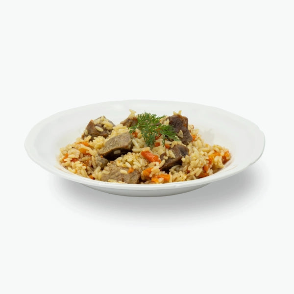 Rice dish "PLOV" with pork, handmade
