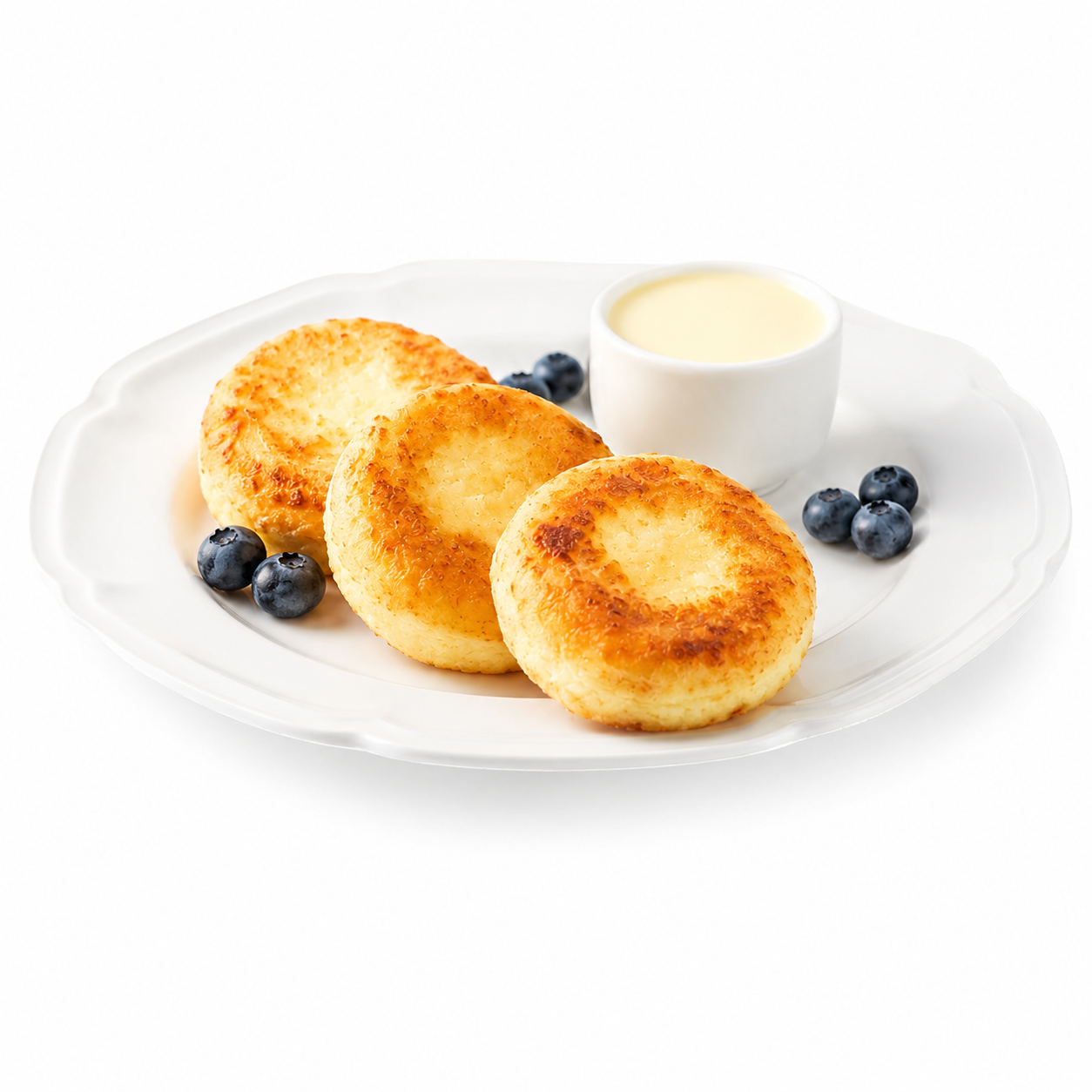 Gebratene Quarkpuffer „Sirniki“, handgemacht