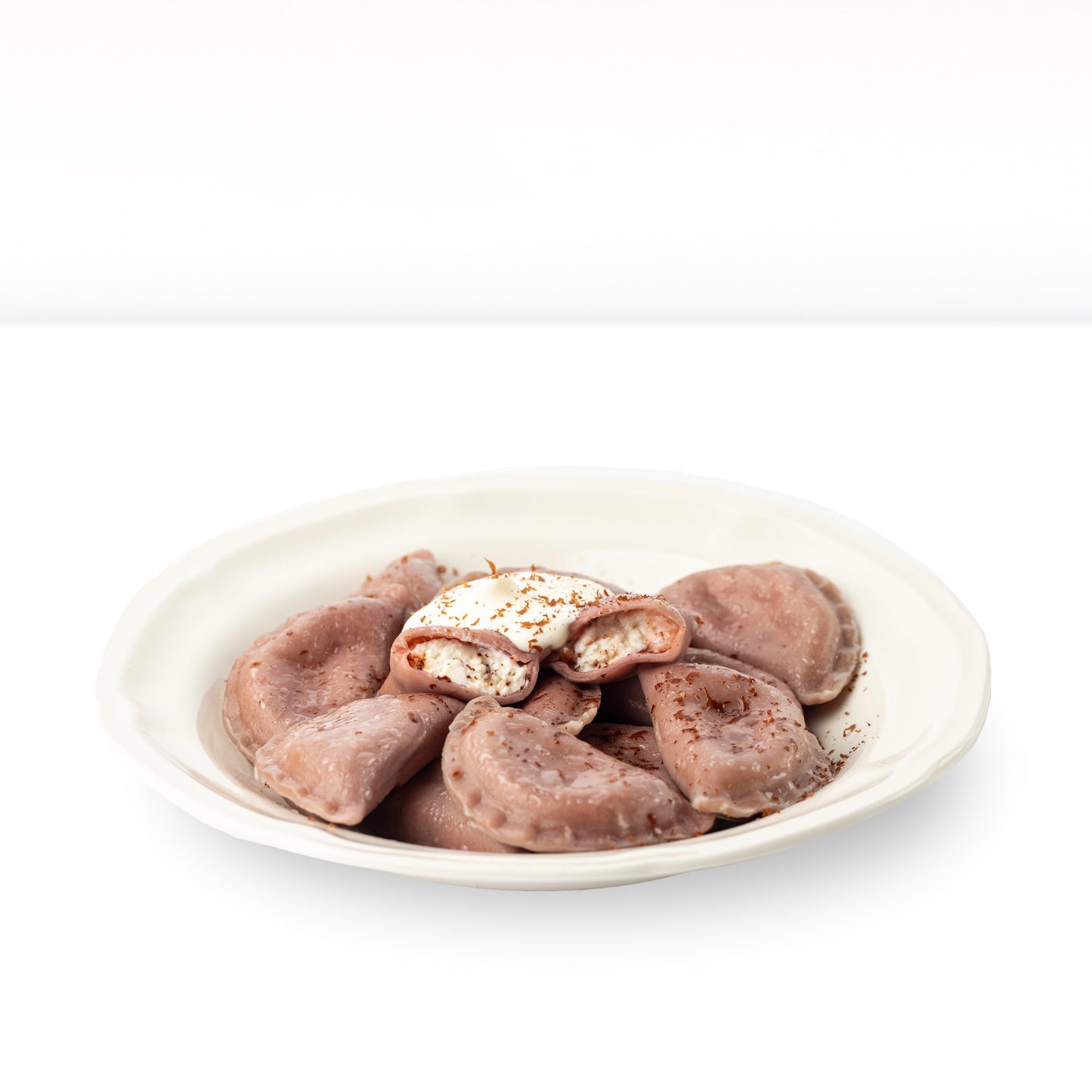 Wareniki "Stracciatella" auf Kirschen Saft mit Quark-Schoko Füllung