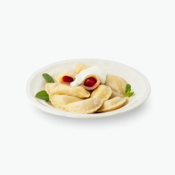 Vareniki with fresh sour cherries, handmade