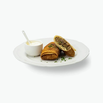 Blinis with meat filling, handmade