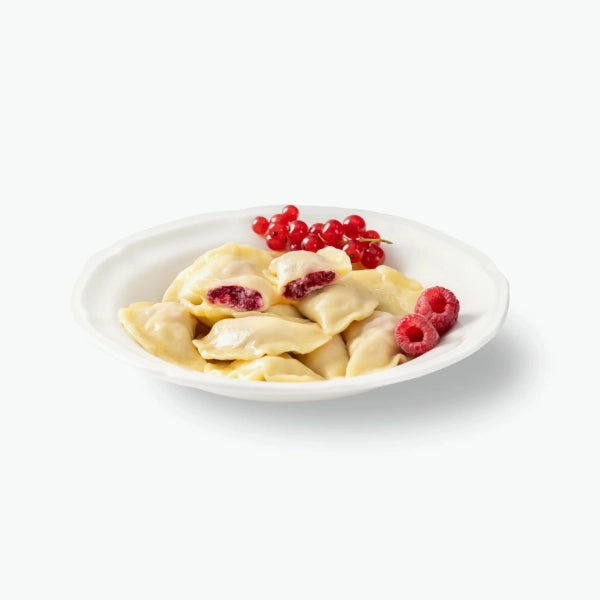 Vareniki with quark and raspberries, handmade