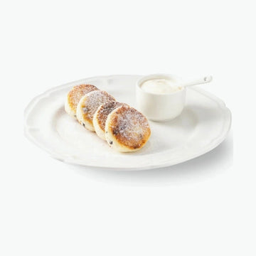 Quarkpuffer "Sirniki" mit Rosinen, handgemacht