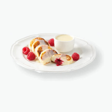Quarkpuffer "Sirniki" mit frischen Himbeeren