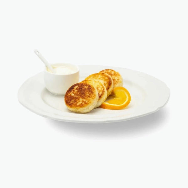 Quarkpuffer "Sirniki" mit Orangen, handgemacht