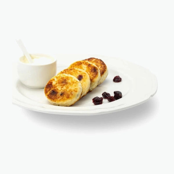Quarkpuffer "Sirniki" mit Moosbeeren, handgemacht