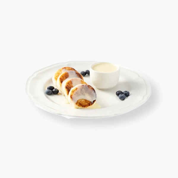 Quark fritters "Sirniki" with coconut, handmade 