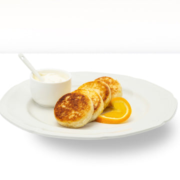 Quarkpuffer "Sirniki" mit Orangen, handgemacht