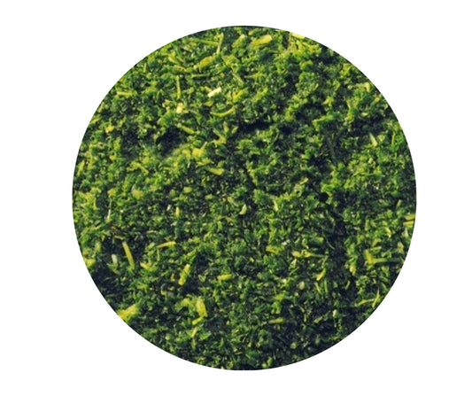 Basilikum, fein gehackt, tiefgefroren