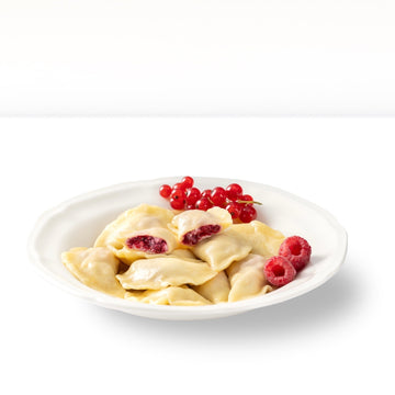 Vareniki with quark and raspberries, handmade