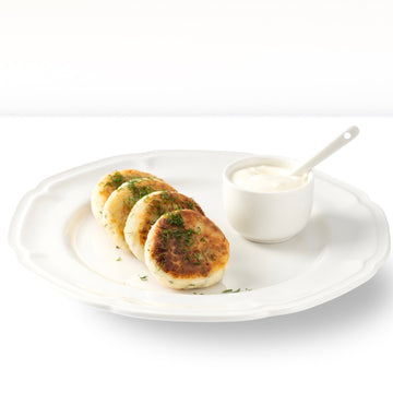 Quarkpuffer "Sirniki" mit Kräutern, gesalzen