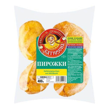 Yeast dough pastries with white cabbage, fried 