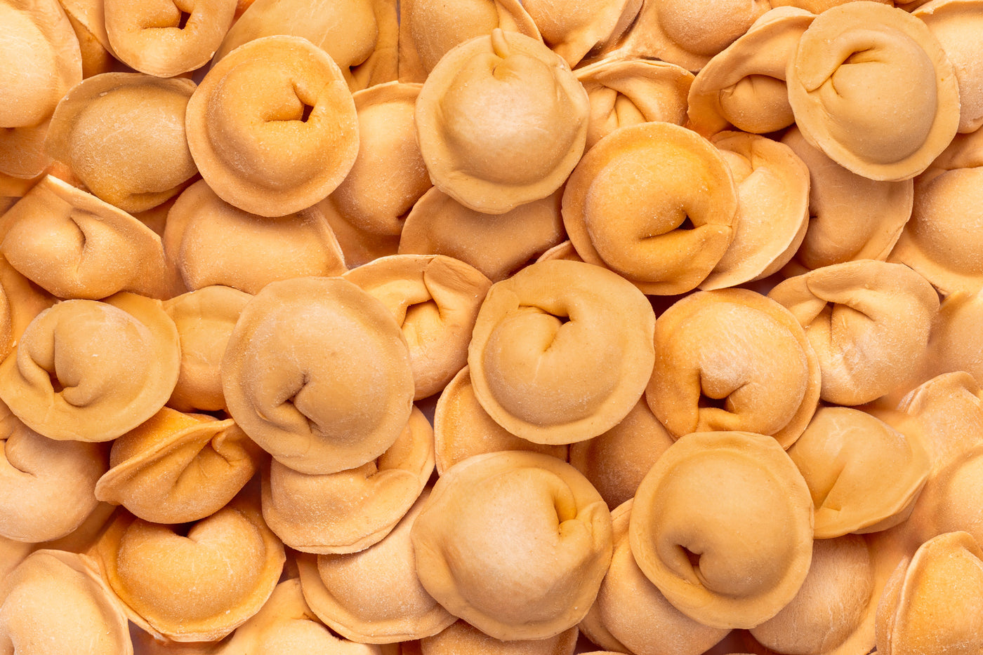 Tomato pelmeni with beef, handmade