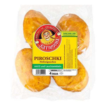 Yeast dough pastries with egg and spring onions, fried 