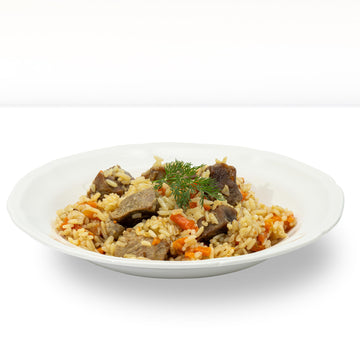 Reisgericht "PLOV" mit Schweinefleisch, handgemacht