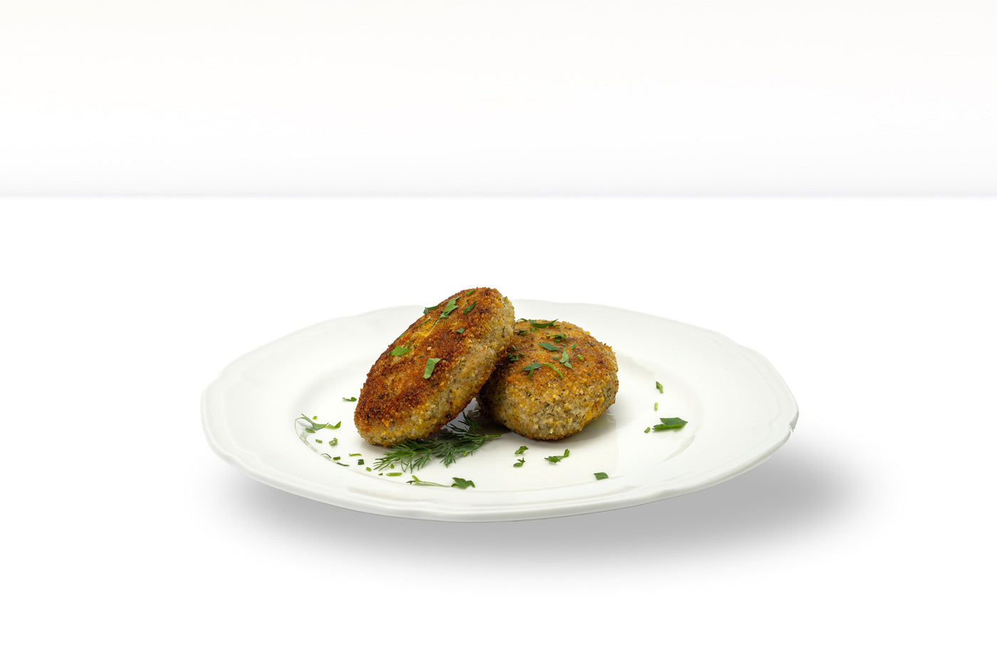 Frikadellen aus Putenfleisch in Parmesan-panade