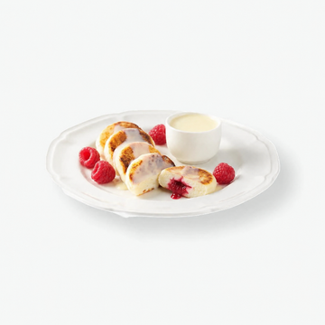 Quarkpuffer "Sirniki" mit frischen Himbeeren