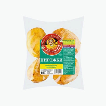 Hefeteigtaschen mit Weisskraut , gebraten