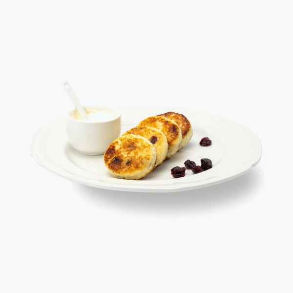 Quark fritters "Sirniki" with cranberries, handmade